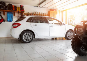 interior of a clean garage with a car.