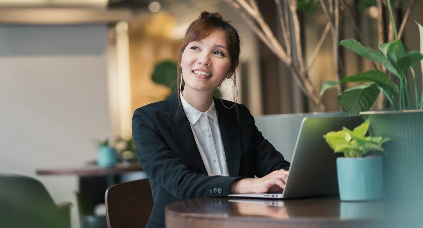 Woman in office with plants