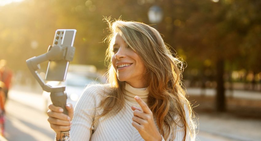Woman recording selfie video