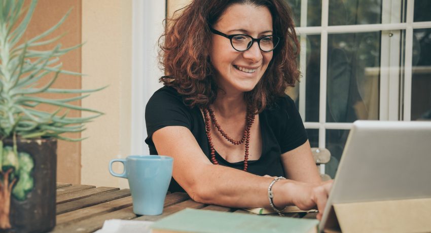 woman working at home on patio