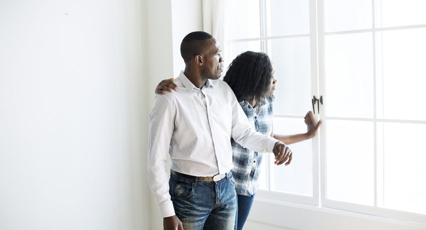 Couple checking out the new house