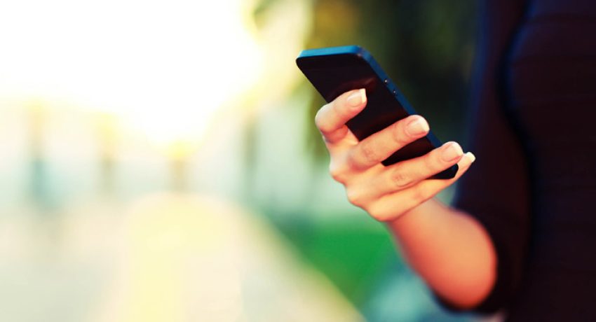 Woman on Cellphone with Apps