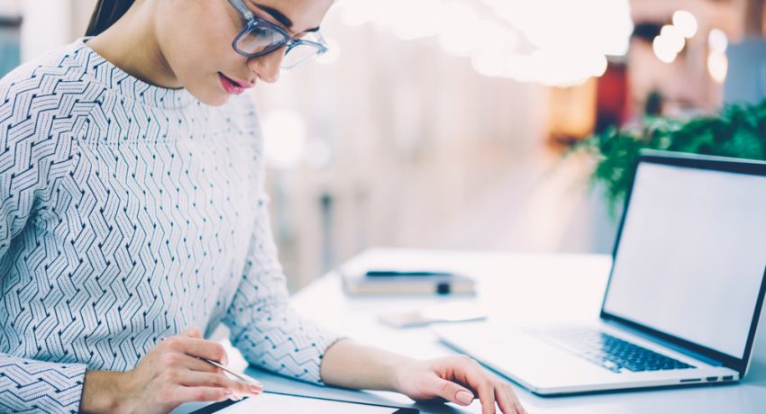 woman signing a document online