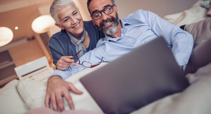 Couple Looking at Laptop Computer