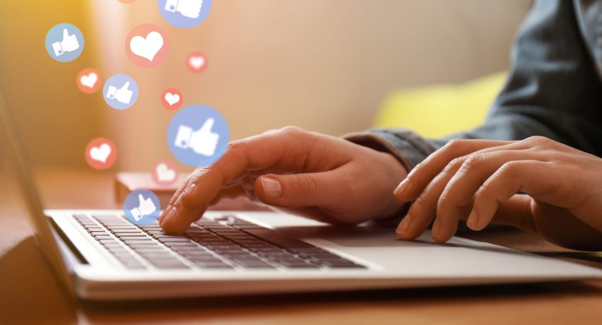 laptop with social media notifications
