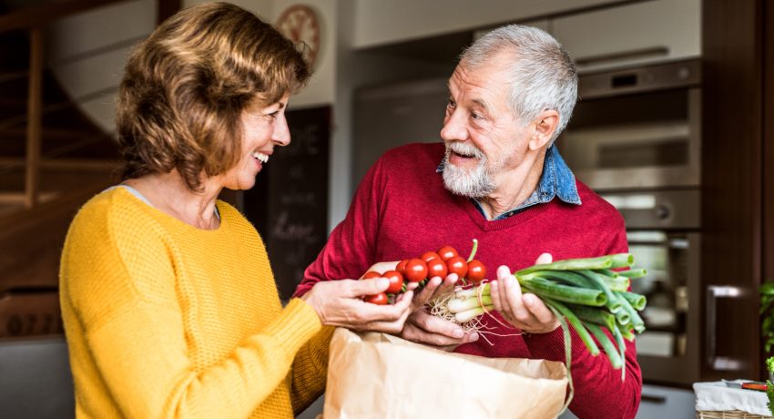 senior couple with groceries